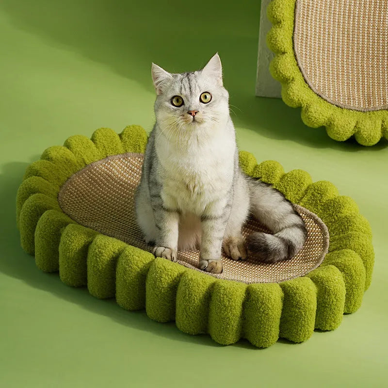 Green oval sisal cat scratch pad bowl measuring 650mm functioning as cat scratcher and bed