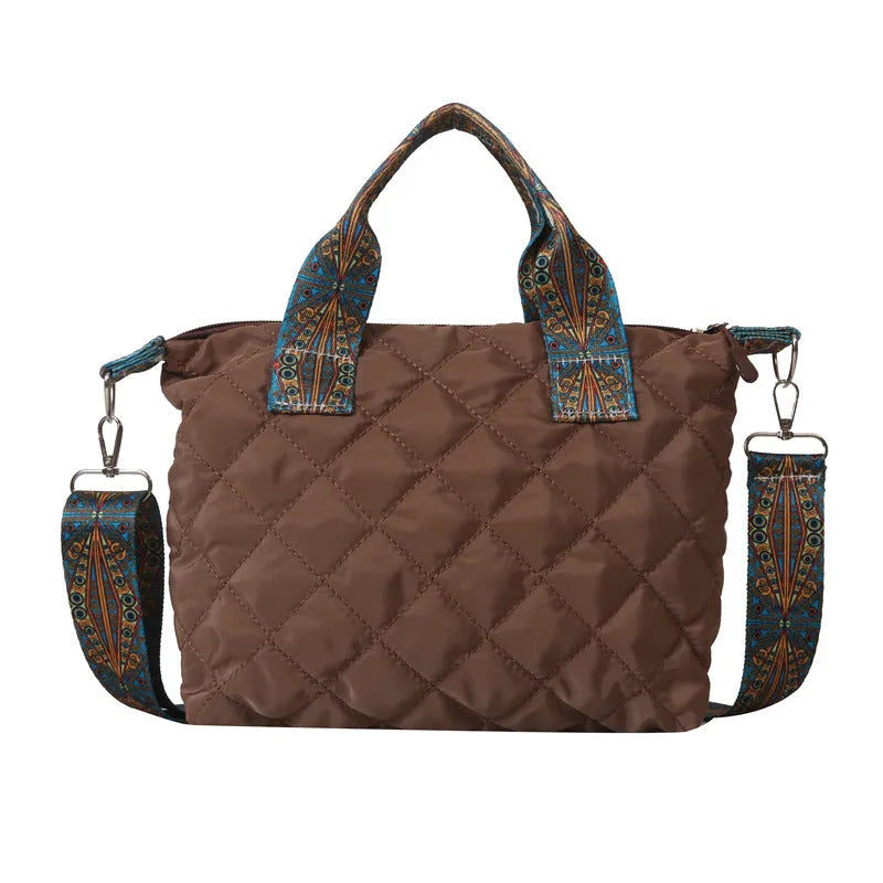 Simple shoulder messenger bag in Oxford cloth shown in multiple colours with embroidery detail and outer sandwich pocket.