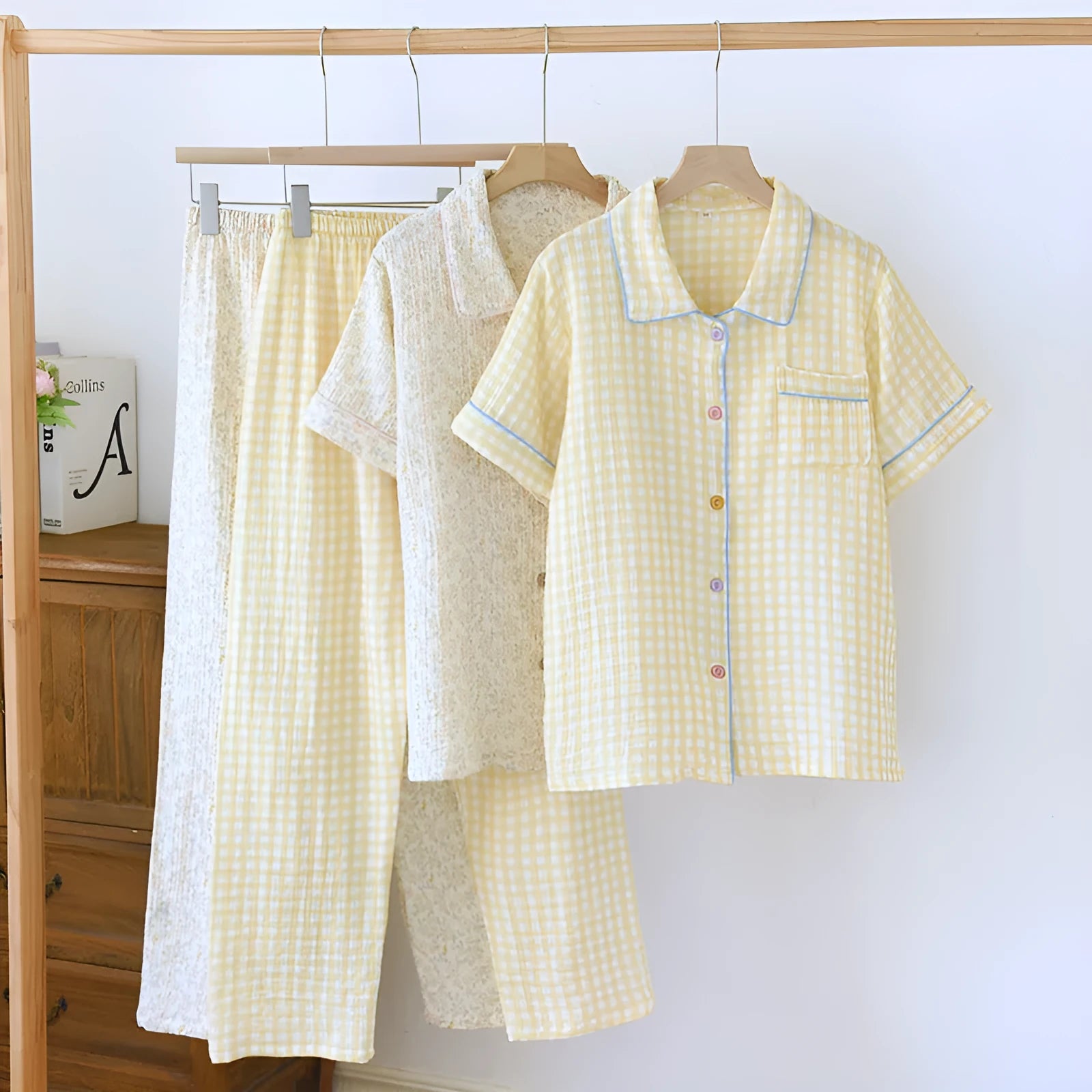 Washed cotton short-sleeved trouser set in a loose, casual style for summer, shown in a floral or plaid pattern.