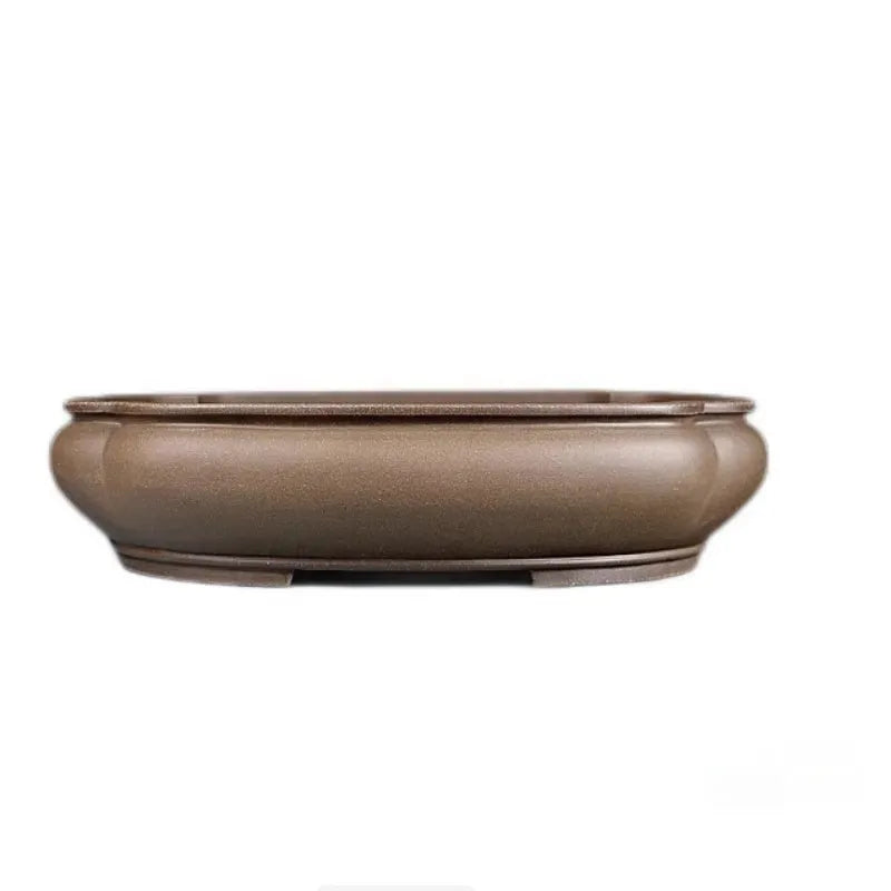 Handmade antique papaya-shaped purple clay flower pot measuring 46cm long by 35.5cm wide.