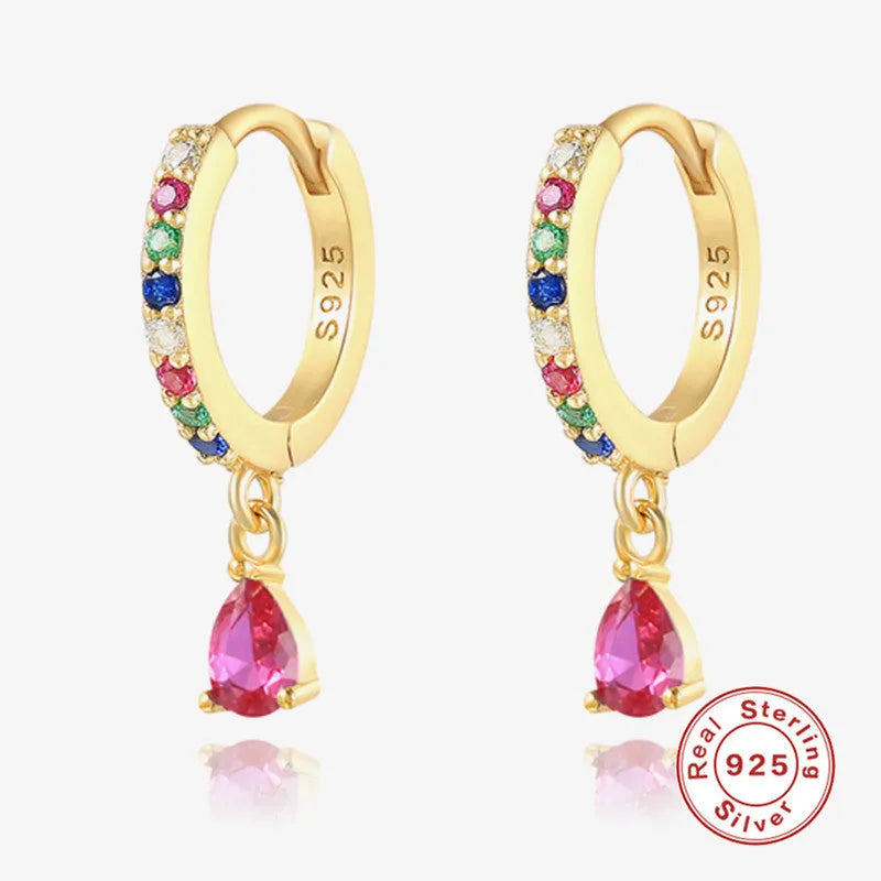 Geometric water drop sterling silver earrings with electroplated finish and sparkling stone detail.