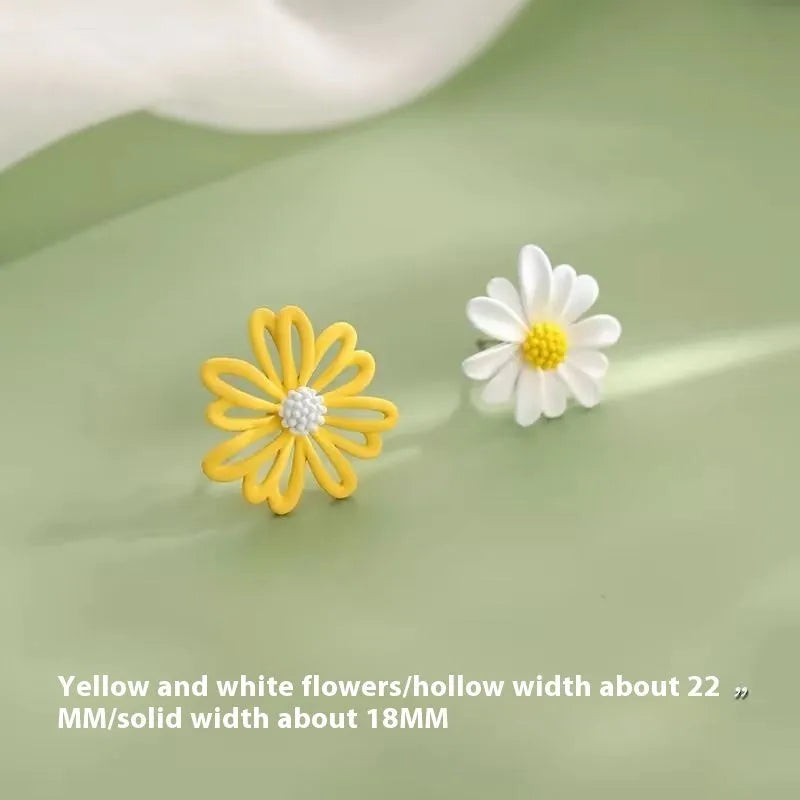 Alloy cartoon flower stud earrings in blue and orange, white and green, or yellow and white two-tone colours.