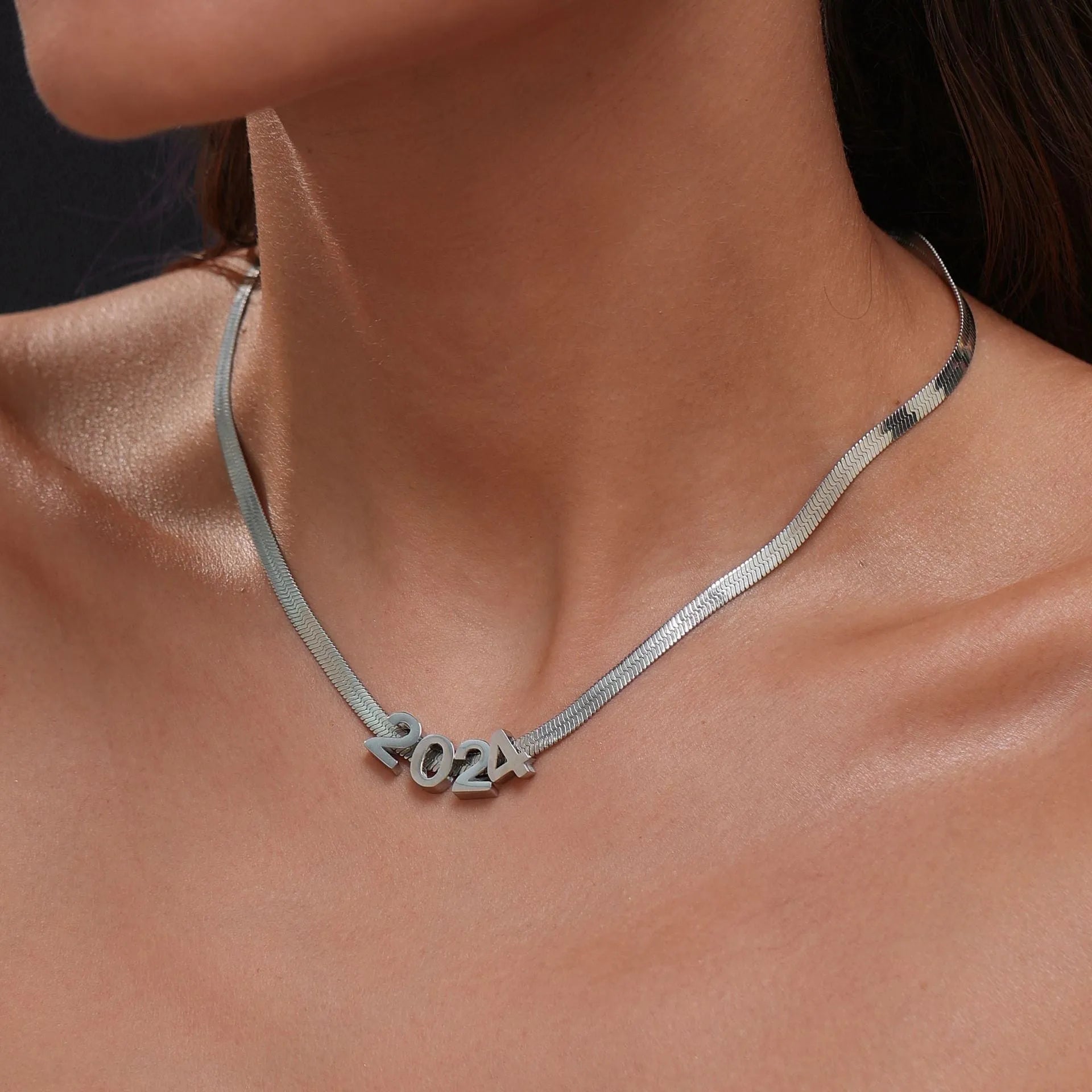 Gold plated titanium steel necklace with the letter A pendant on a 40.5cm chain.