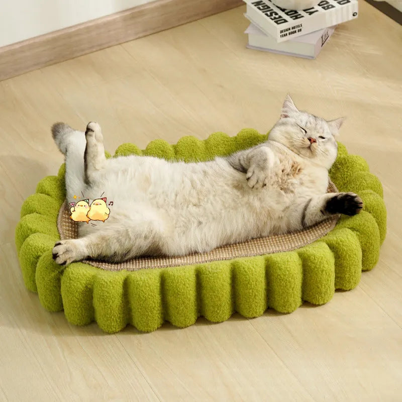 Green oval sisal cat scratch pad bowl measuring 650mm functioning as cat scratcher and bed