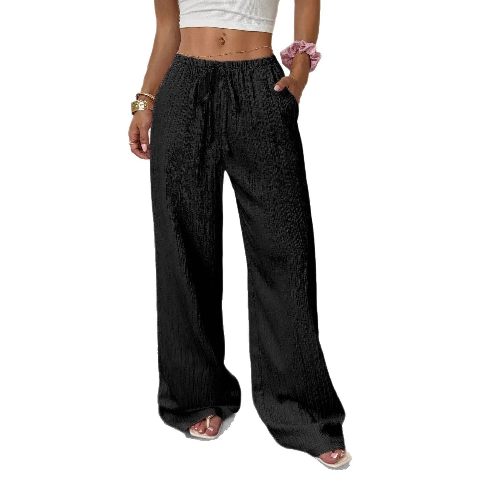 Women's wide leg trousers with lace-up waist detail in black or pink polyester fabric