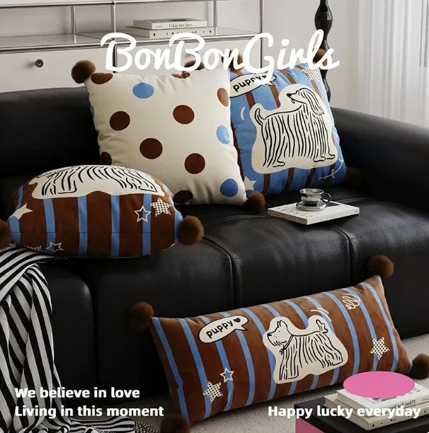 Blue cartoon animal decorative cushion pillow on a grey sofa with a removable cover.