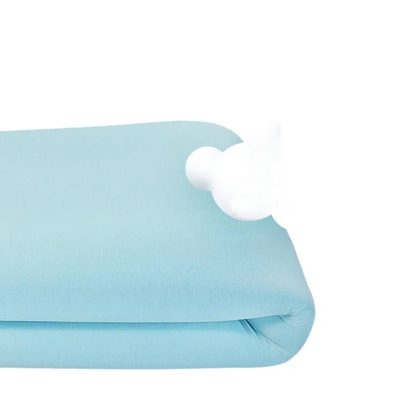 Thin gel memory cotton tatami mattress showing slow rebound texture on a wooden floor.