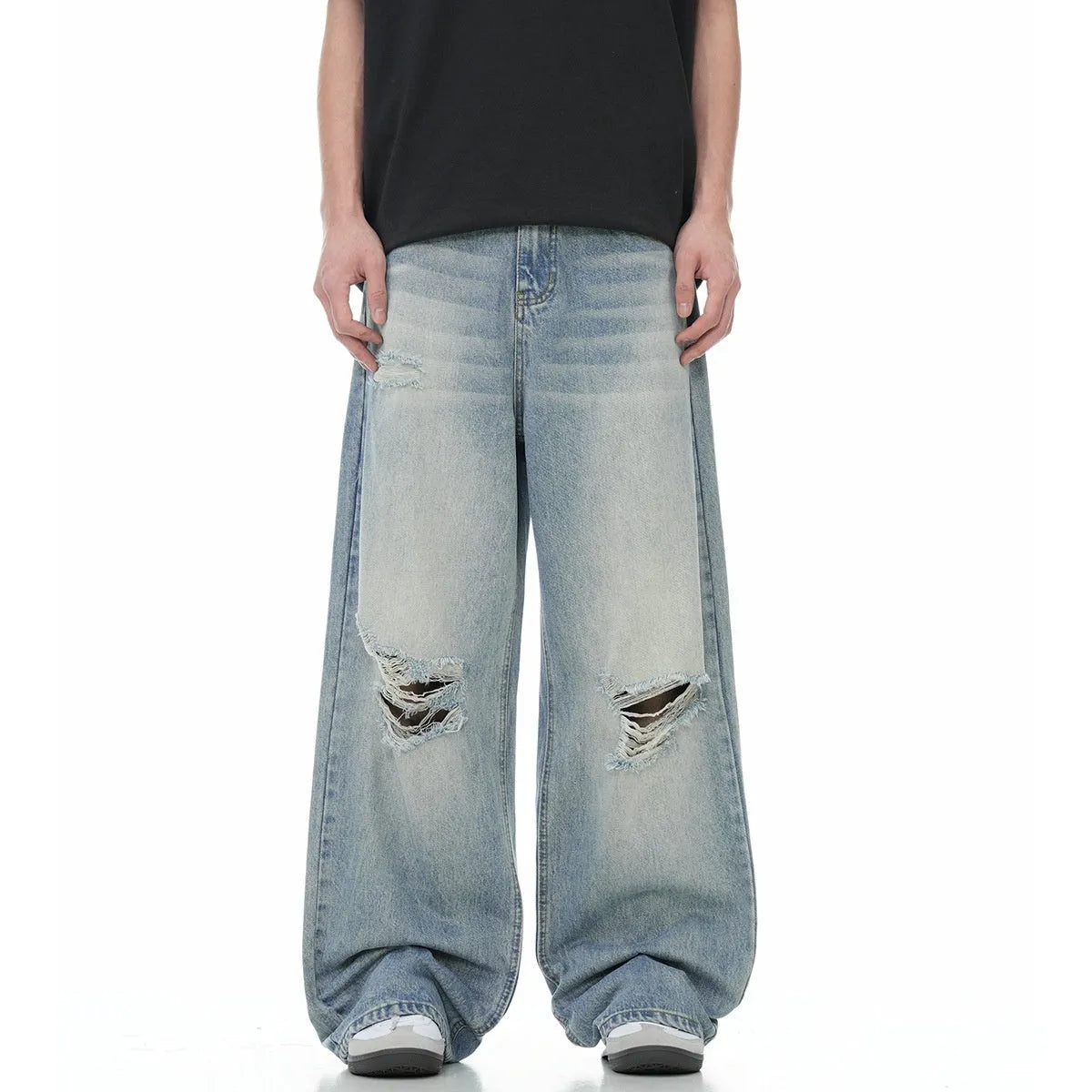 Men's blue straight-leg jeans with retro ripped distressing on the legs