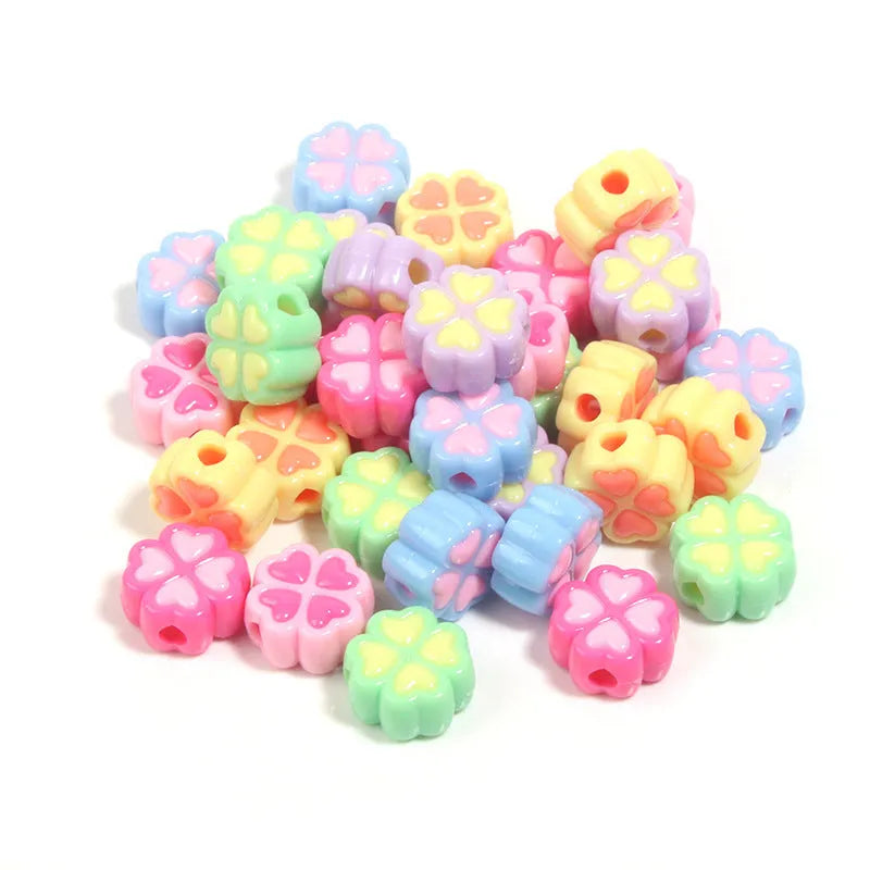 15mm acrylic four-leaf clover beads with frosted finish in various colours including rose red, pink, yellow, green, blue, purple