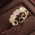 Adjustable opening couples ring with heart design in gold or silver colour on small finger