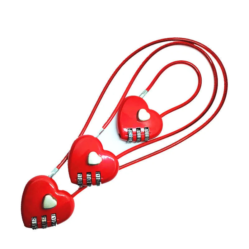 Peach heart design wire rope cable lock in red with steel rope, shown securing a bicycle helmet.
