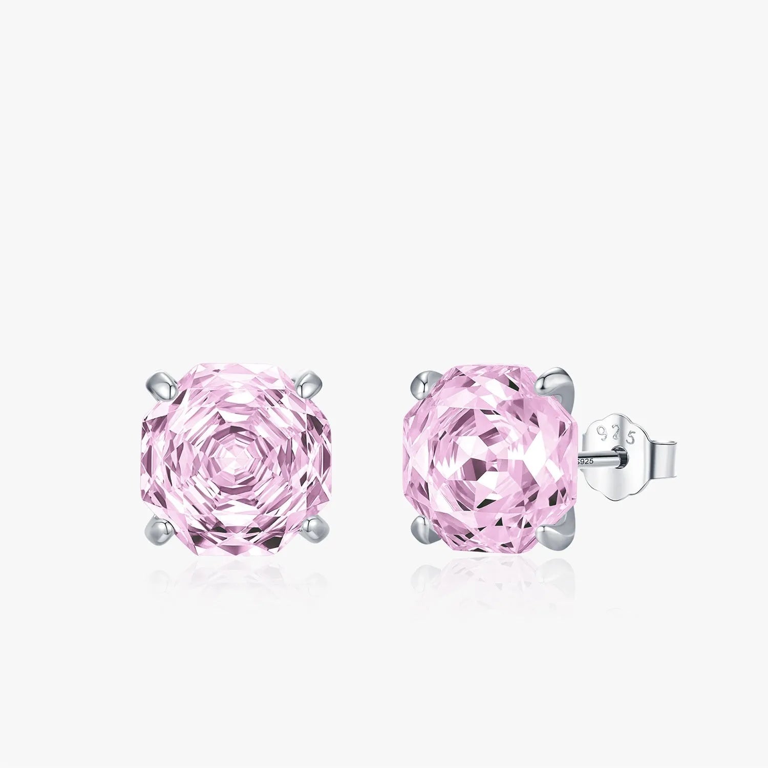 Close-up of a pair of pink rose stud earrings made from S925 sterling silver, shown on a plain background.