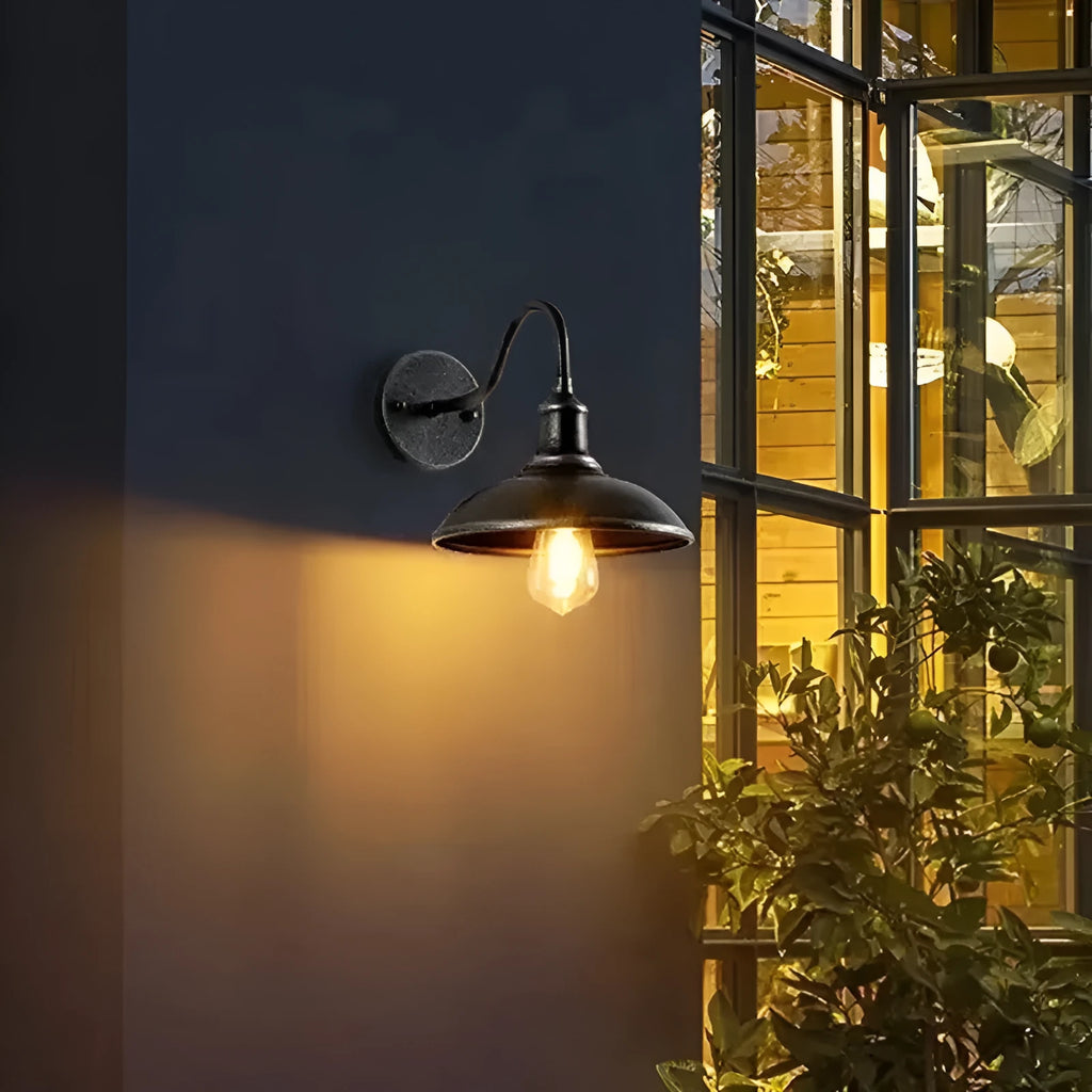 Retro-style outdoor wall lamp for a villa courtyard, shown in copper and silver finish options.
