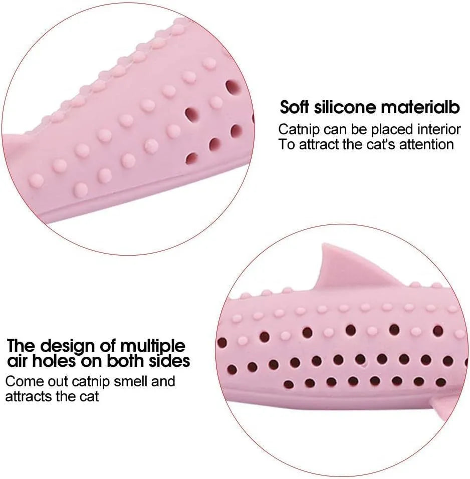 Green fish-shaped silicone chew toy for cats with visible side holes and a removable section for catnip.