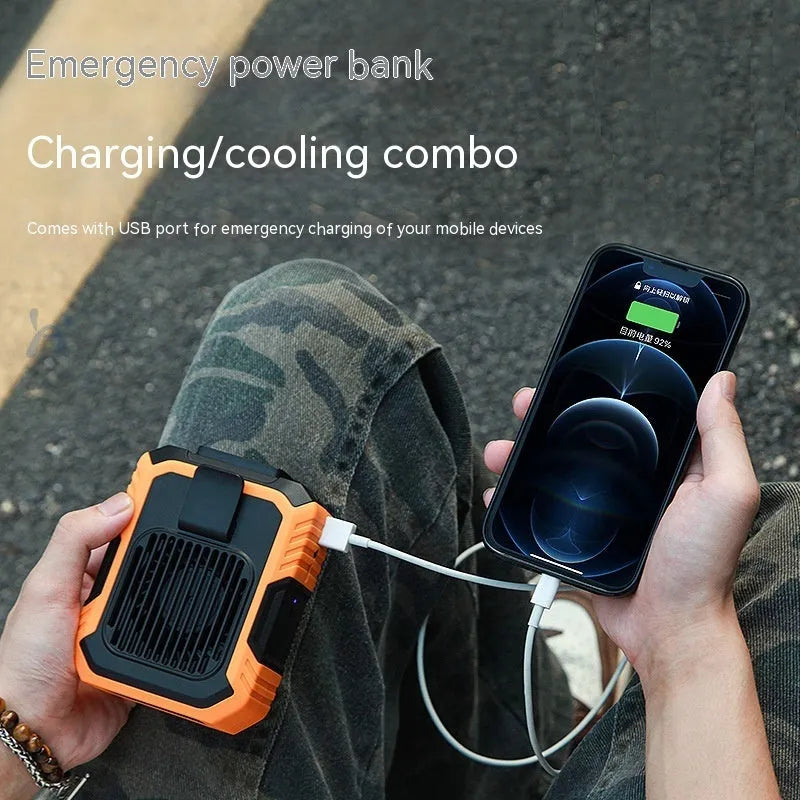 Green wrist hanging fan with light and USB port, shown with adjustable strap.