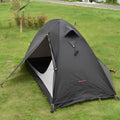 Single person camping tent with aluminium poles in red colour showing double-layer construction