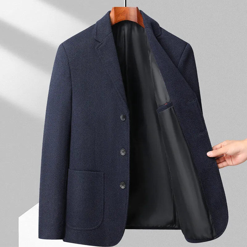 Loose-fit men's woolen coat in black, shown on a model for casual spring or autumn wear.