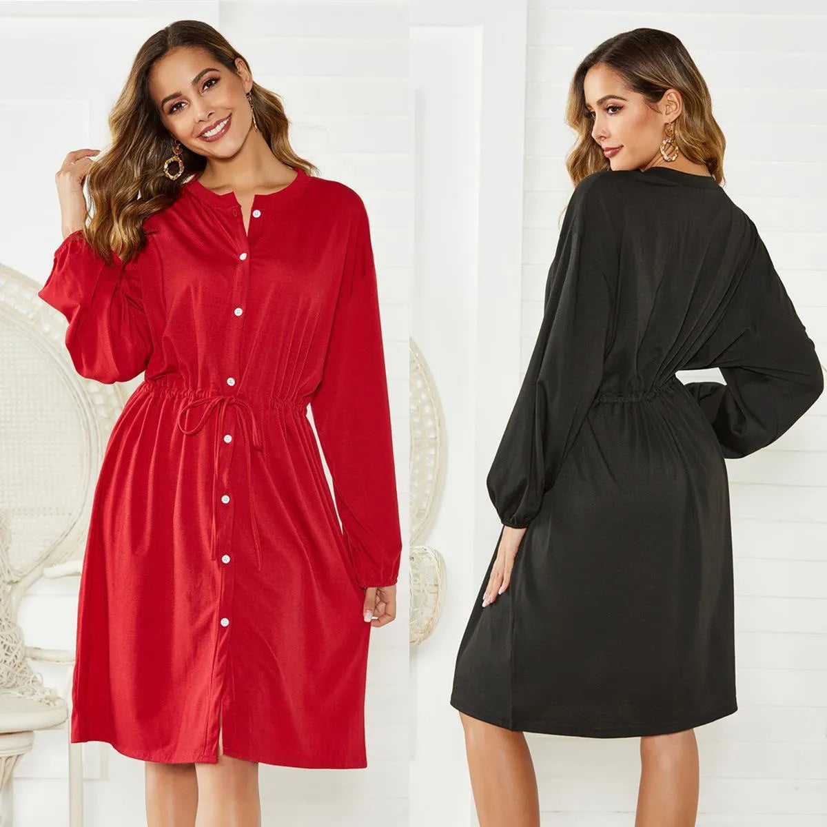 Black mid-length A-line dress with elastic waist, cinched belt, and long sleeves with elastic cuffs