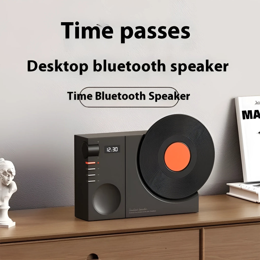 Compact portable Bluetooth speaker in Obsidian Black colour showing card insertion slot and USB charging port.