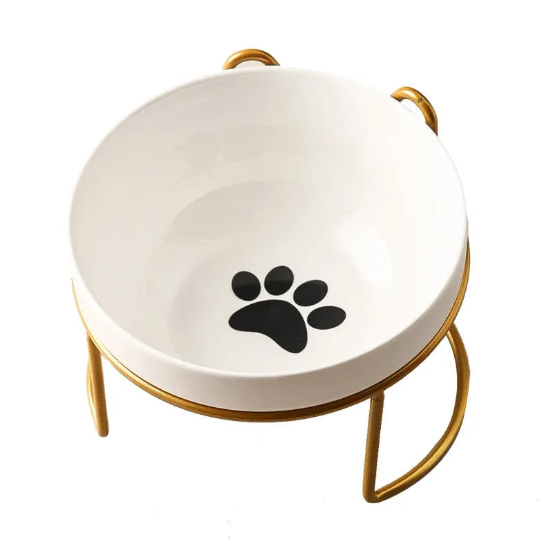 White ceramic cat bowl with cat paw design in black iron frame
