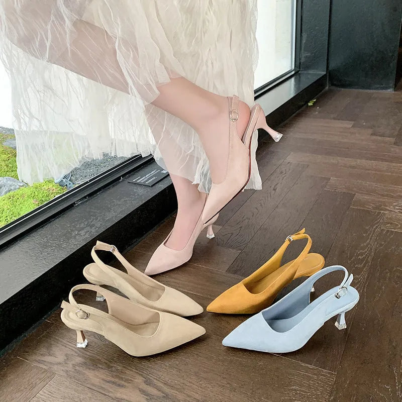 Women's apricot suede pointed toe stiletto heels on white background