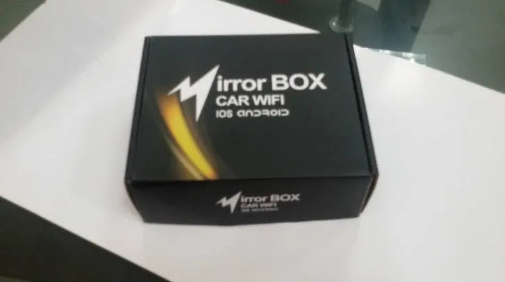 Black car mirror link box Wi-Fi converter with power cable, AV cable, antenna, and user manual for screen mirroring.