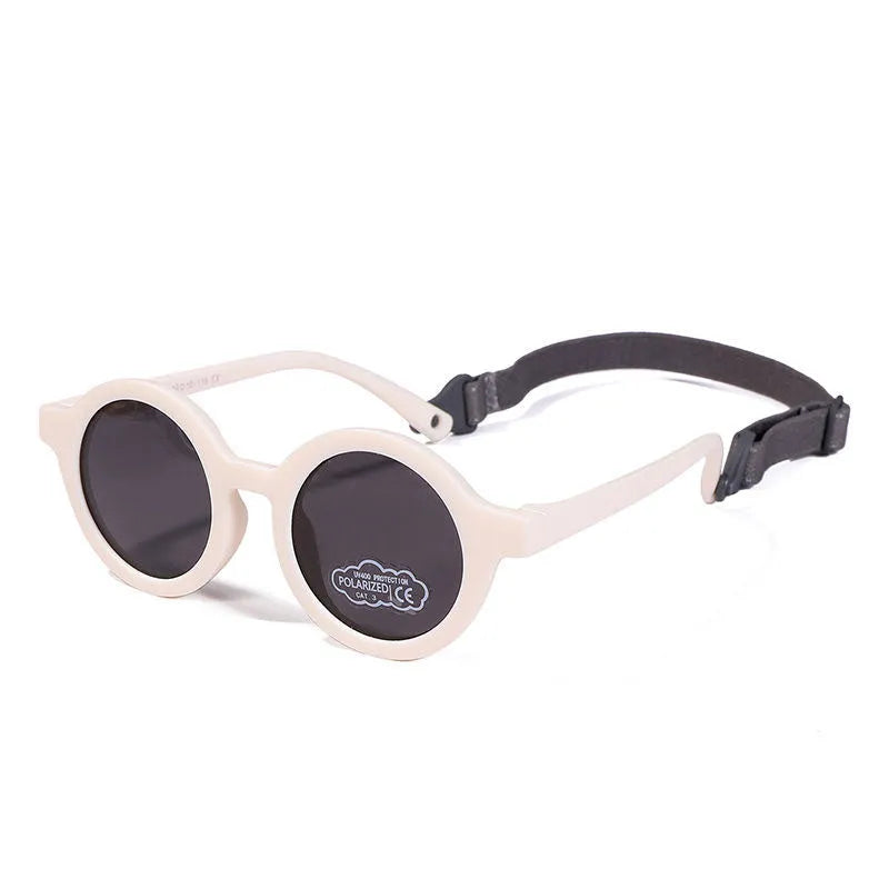 Soft silicone round-frame sunglasses for babies and toddlers aged 0-3 years with polarised UV400 lenses.