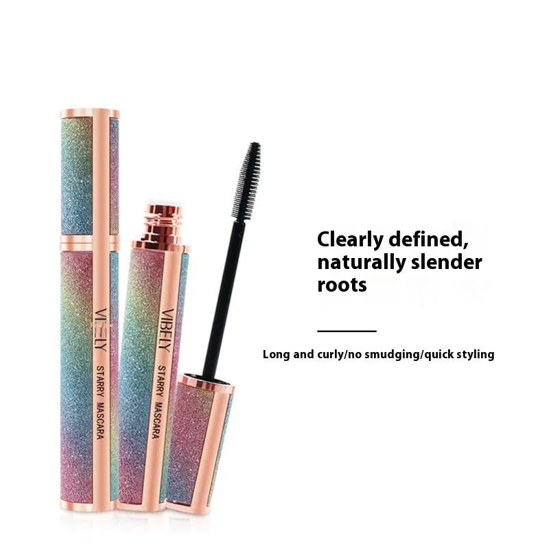 Black waterproof mascara tube with 4D curling wand for long, thick lashes
