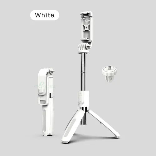 Black Bluetooth selfie stick extended to full length with smartphone attached and remote control in hand