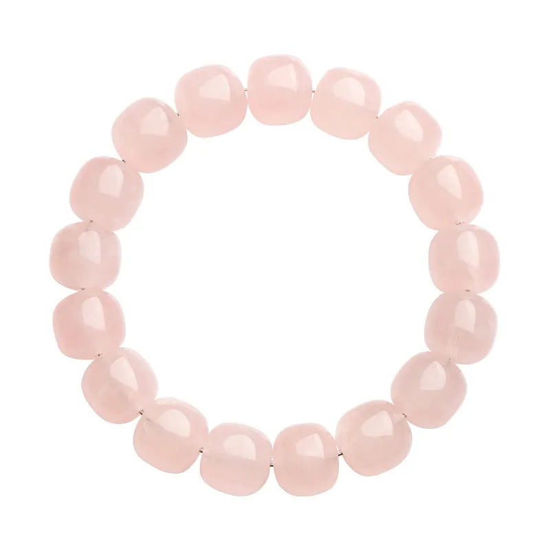 Pink crystal barrel bead bracelet with bamboo accents and geometric design
