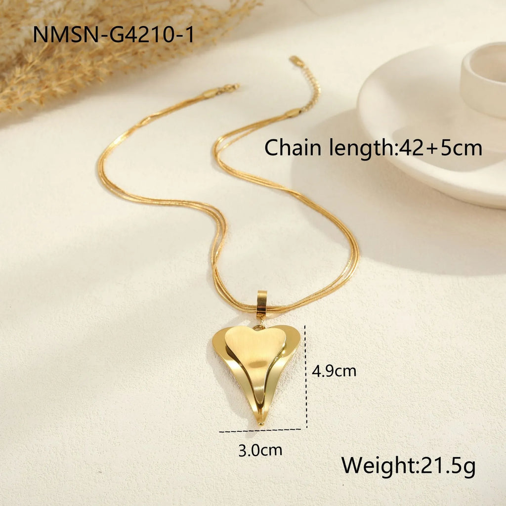 Double heart snake bones geometric necklace in gold and steel stainless steel finishes