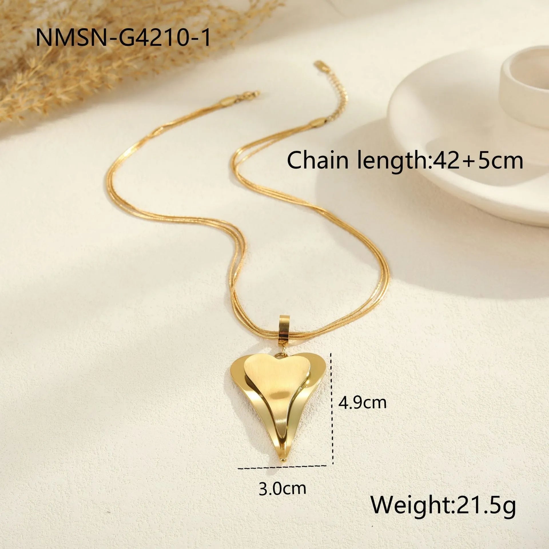 Double heart snake bones geometric necklace in gold and steel stainless steel finishes