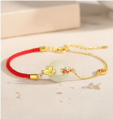 Koi Peace Buckle Hetian Jade Red Rope Bracelet with gold clasp on 925 silver