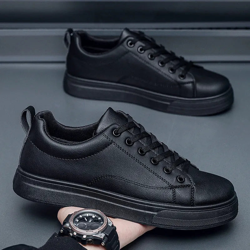 Men's Korean-style low-top sneakers in black, white, or black with white bottom colours