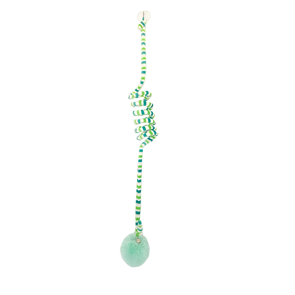 Colourful suction cup cat toy with spring wand and inflatable ball, hanging on a glass door