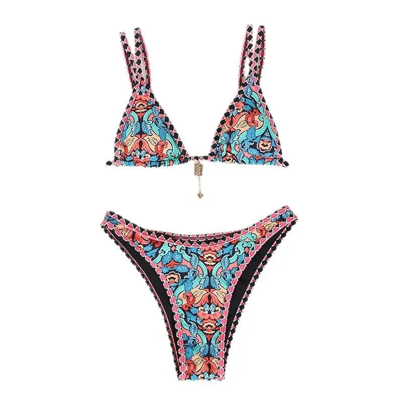Retro four-colour print women's bikini swimwear in briefs style on a mannequin.