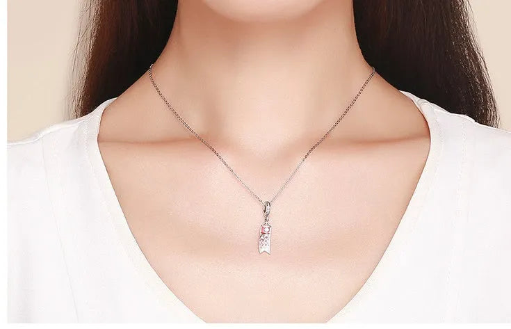 S925 sterling silver carp streamer pendant necklace with zircon stones and oil drop detailing.