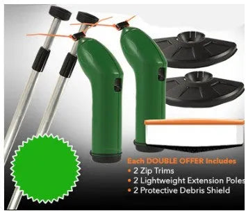 Cordless electric lawn trimmer with extension pole and black debris shield on a green lawn.