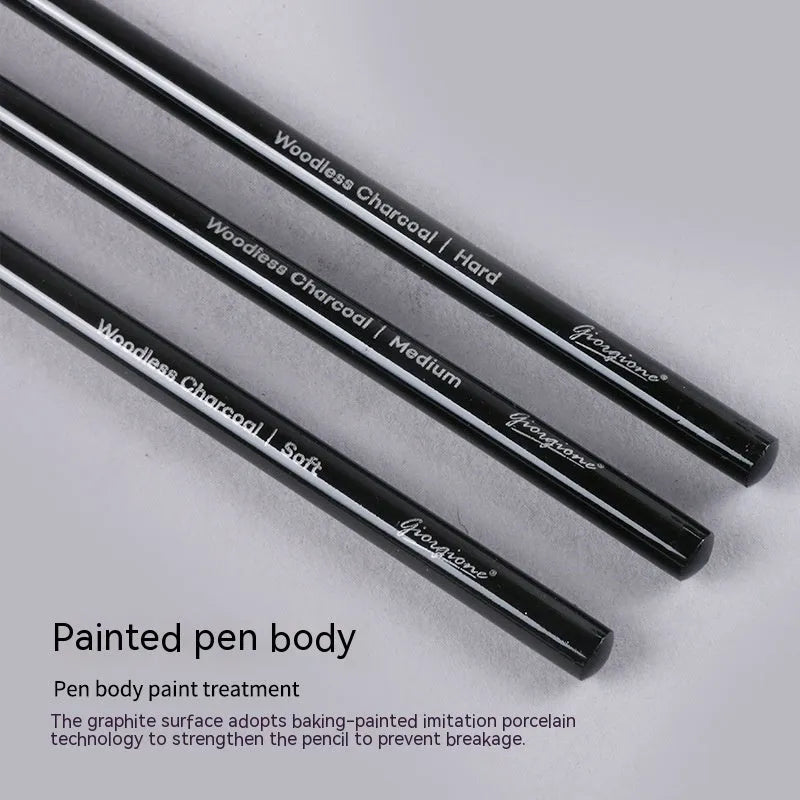 Graphite and carbonized wooden drawing pencils with solid lead cores on suction card packaging