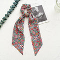 Long cloth ribbon hair tie with large intestine ring shape in Spring dark green colour