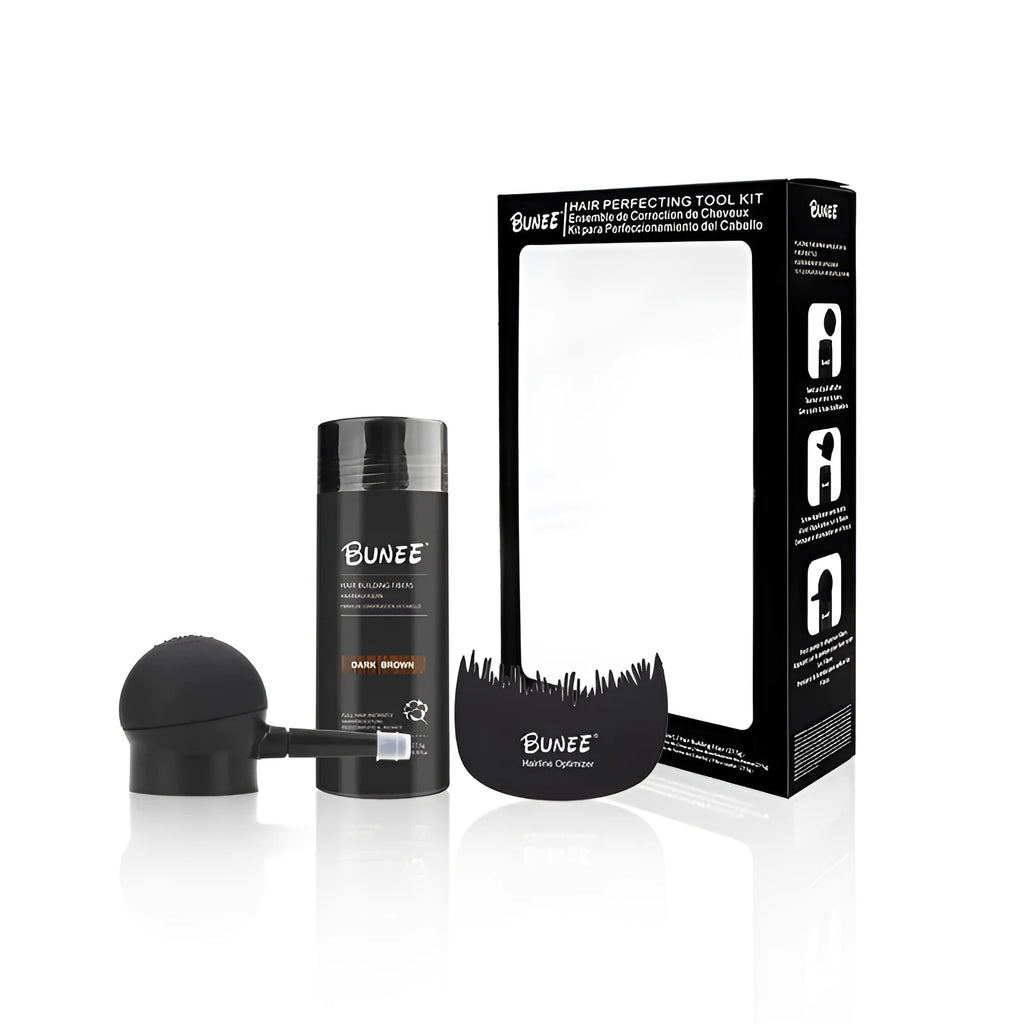 Dense Hair Fibre Powder three-piece set showing powder bottle, applicator brush and travel case.