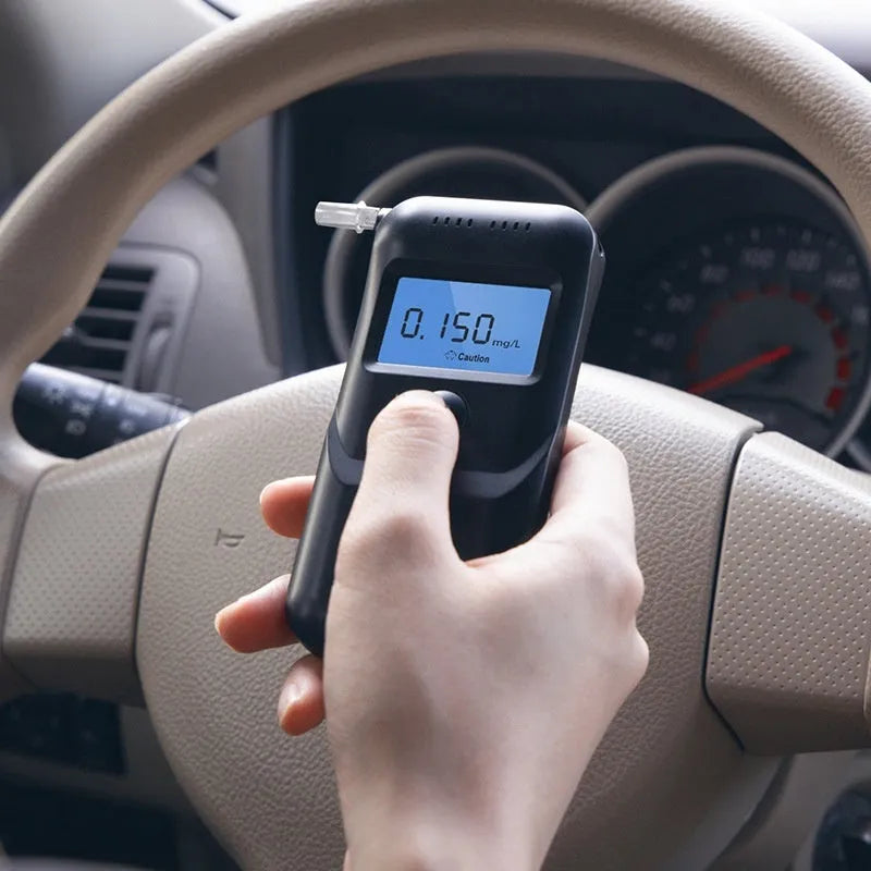 Black household alcohol breath tester device for drinking checks and drunk driving prevention