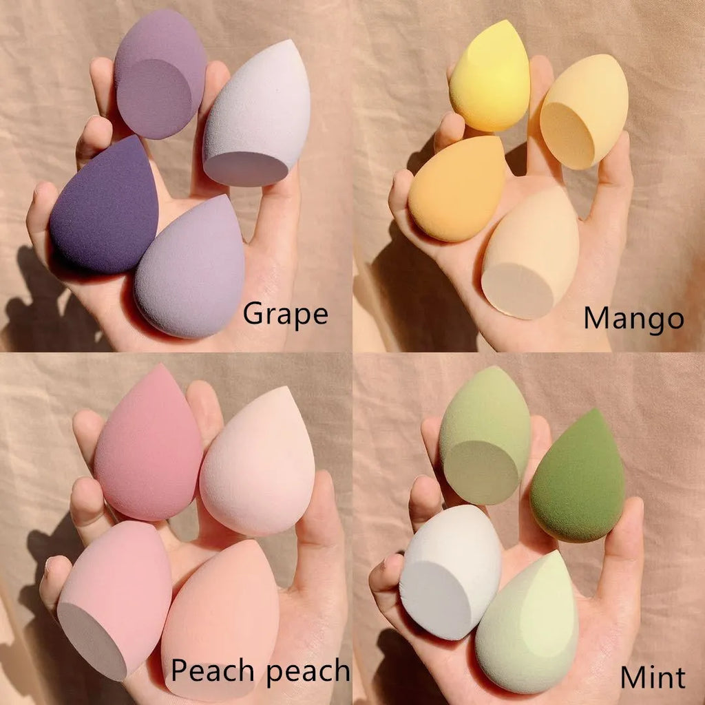 Makeup egg box containing four synthetic sponge beauty blenders in grape, mango, mint and peach colours