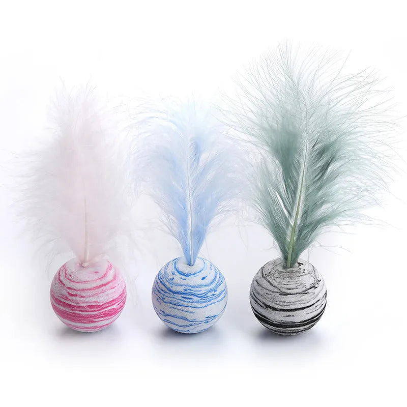 Rainbow EVA foam and feather cat toy ball for grabbing, training and chewing, in Black, Blue or Pink.