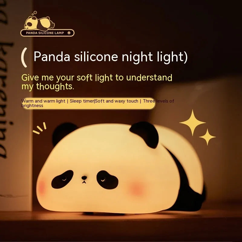 Panda-shaped night light with warm white LED glow and silicone construction