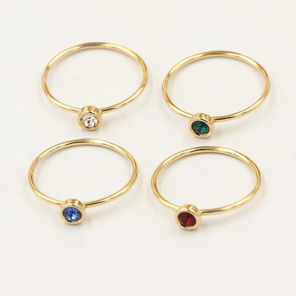 Women's knuckle ring with gilded GF setting and zircon stones on adjustable copper band