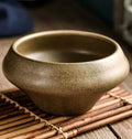 Tall porcelain Japanese soup bowl with stone conch shape and underglaze retro pattern.