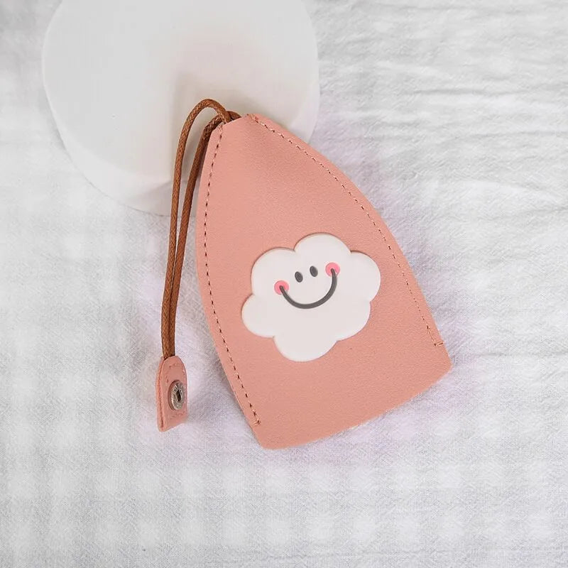 Colourful cartoon pull-out key case made from PU leather showing design options