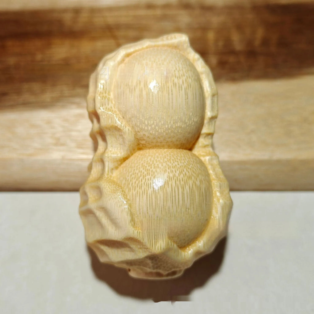 Solid bamboo carving peanut ornament with modern simplicity style and 'May Good Things Happen' message