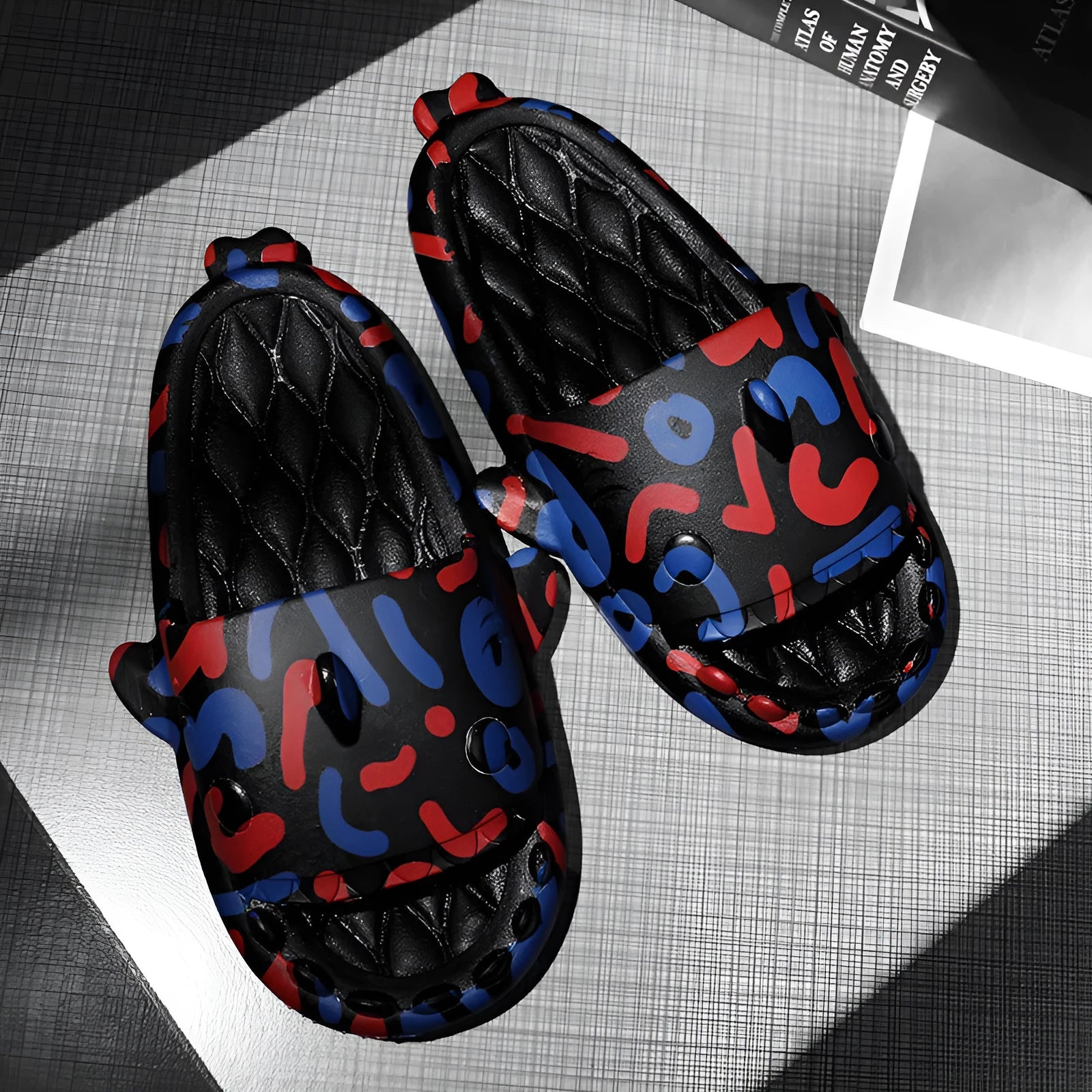 Shark design open-toe EVA slippers for home use in multiple colours and sizes.